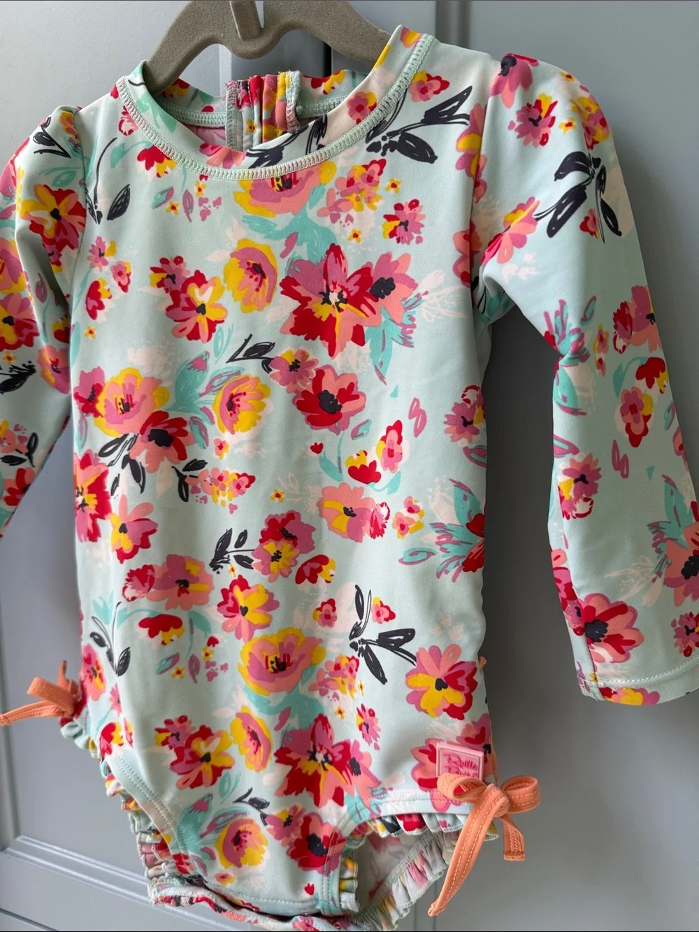 Ruffle Butts Aqua Floral Long-Sleeve Swim One-Piece with Pink and Yellow Flowers